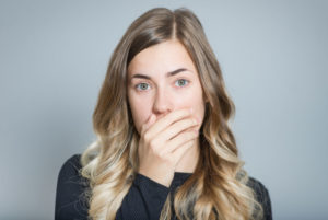Dental Patient Hiding Her Missing Teeth