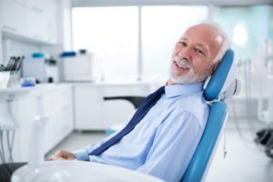 dental patient smiling after his jaw surgery