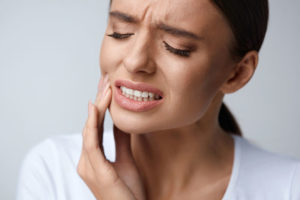 Dental Patient In Pain Due To Not Flossing