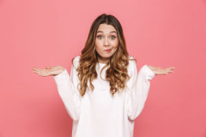 Questioning Dental Implant Patient About The Cost Of Dental Implants