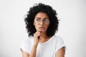 Questioning Dental Patient Wondering About All-On-4 Dental Implants