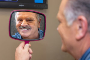 Dental Implant Patient Smiling At His New Dental Implants