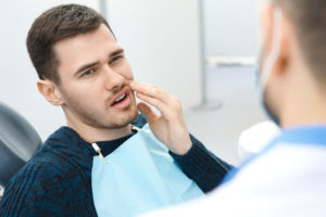 Dental Patient Suffering From Mouth Pain On A Dental Chair, In Monroeville, PA