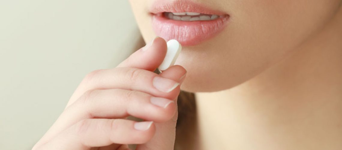 Dental Patient Taking Dental Sedative Pill