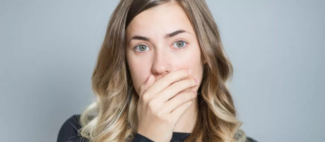 Dental Patient Hiding Her Missing Teeth