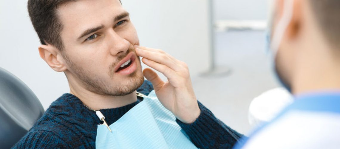 Dental Patient Suffering From Mouth Pain On A Dental Chair, In Monroeville, PA