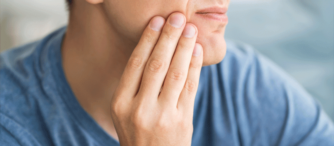 A man with toothache, periodontal disease in wisdom teeth.
